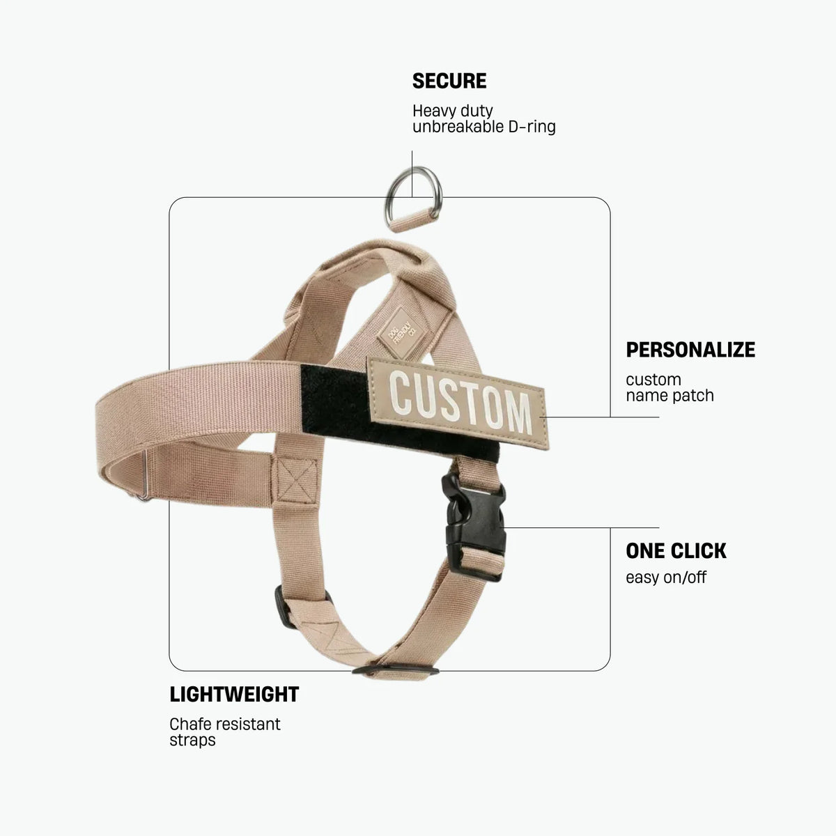 Brown dog harness with labels identifying the heavy-duty back D-ring, lightweight chafe-resistant straps, and one-click buckle.